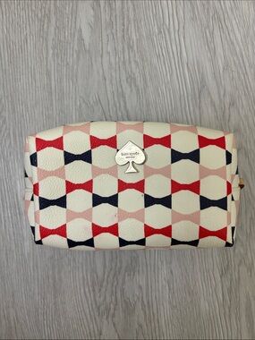 kate spade Cream Cosmetic Pouch with Pink, Red & Navy Bow Pattern